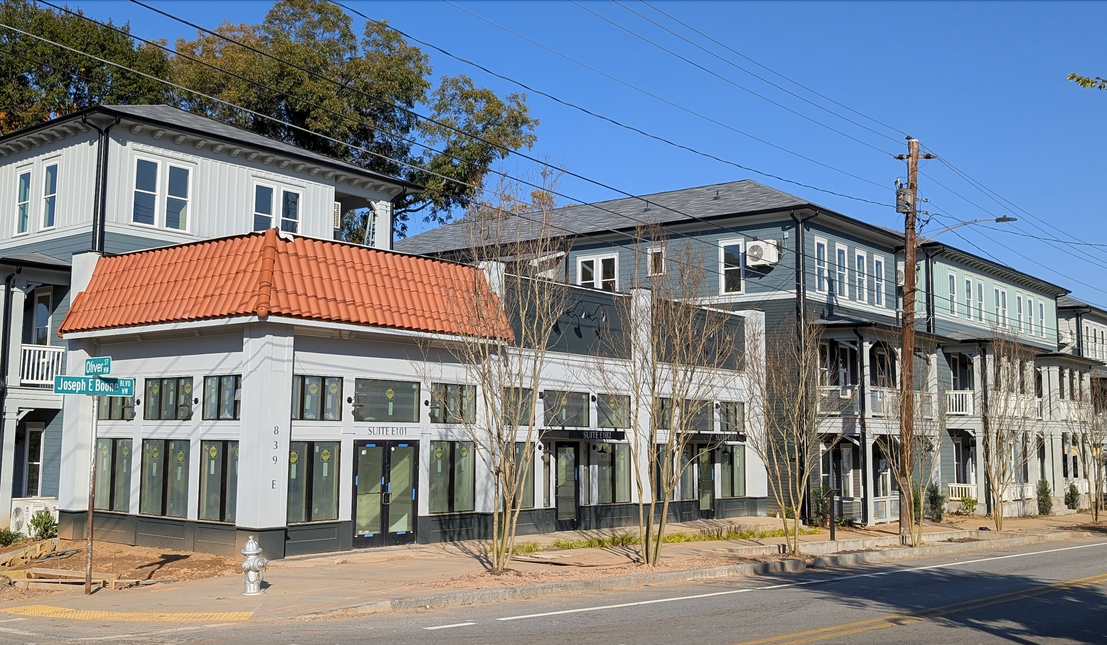 Photos: Vintage-style Westside retail, housing combo nearly finished